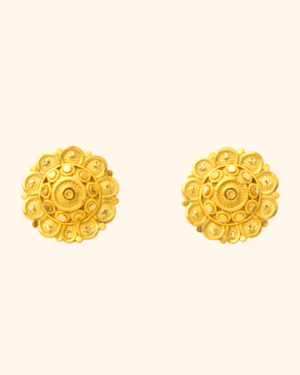 Polished gold stud earrings close-up view